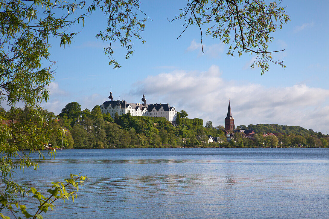 View over lake Grosser Ploener See onto the castle and the Nikolai church, Ploen, nature park Holsteinische Schweiz, Baltic Sea, Schleswig-Holstein, Germany, Europe