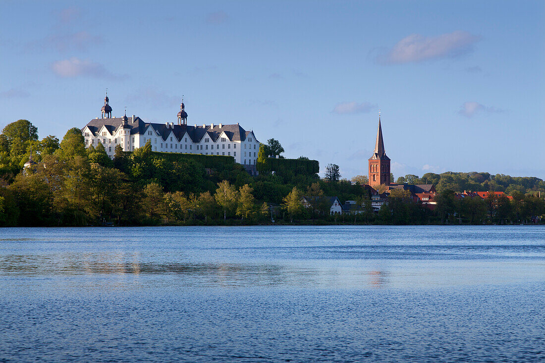 View over lake Grosser Ploener See onto the castle and the Nikolai church, Ploen, nature park Holsteinische Schweiz, Baltic Sea, Schleswig-Holstein, Germany, Europe