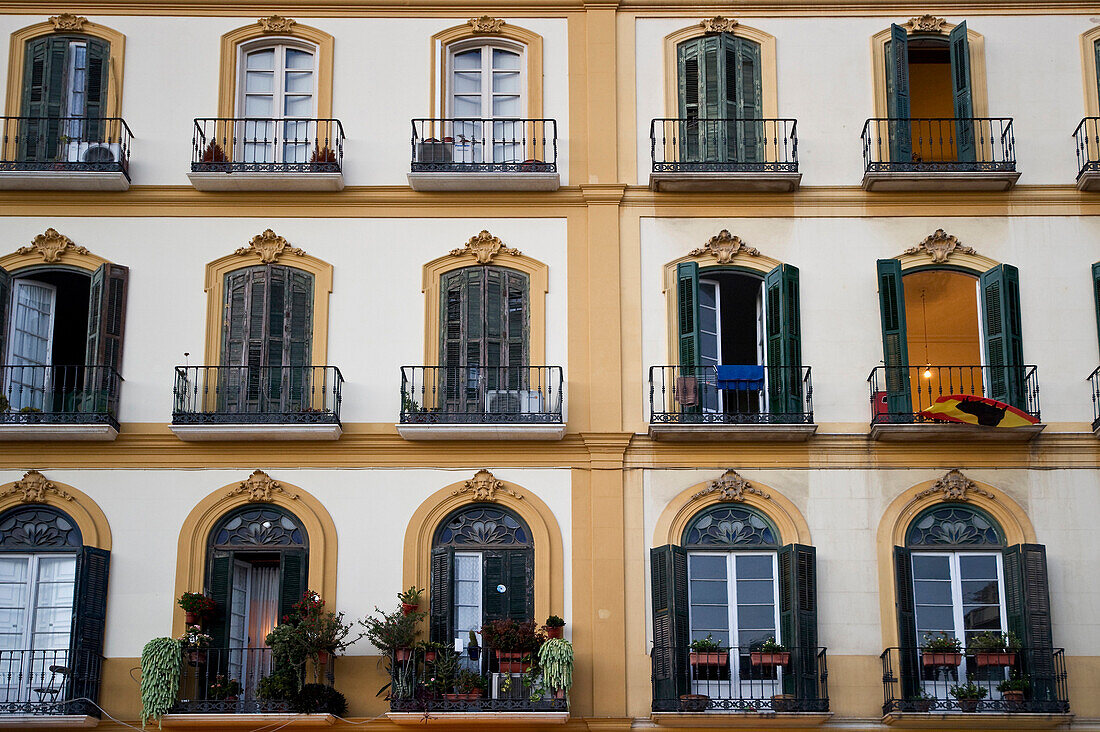 Facade of a houses at Plaza de la Merced, Malaga, Andalusia, Spain, Europe