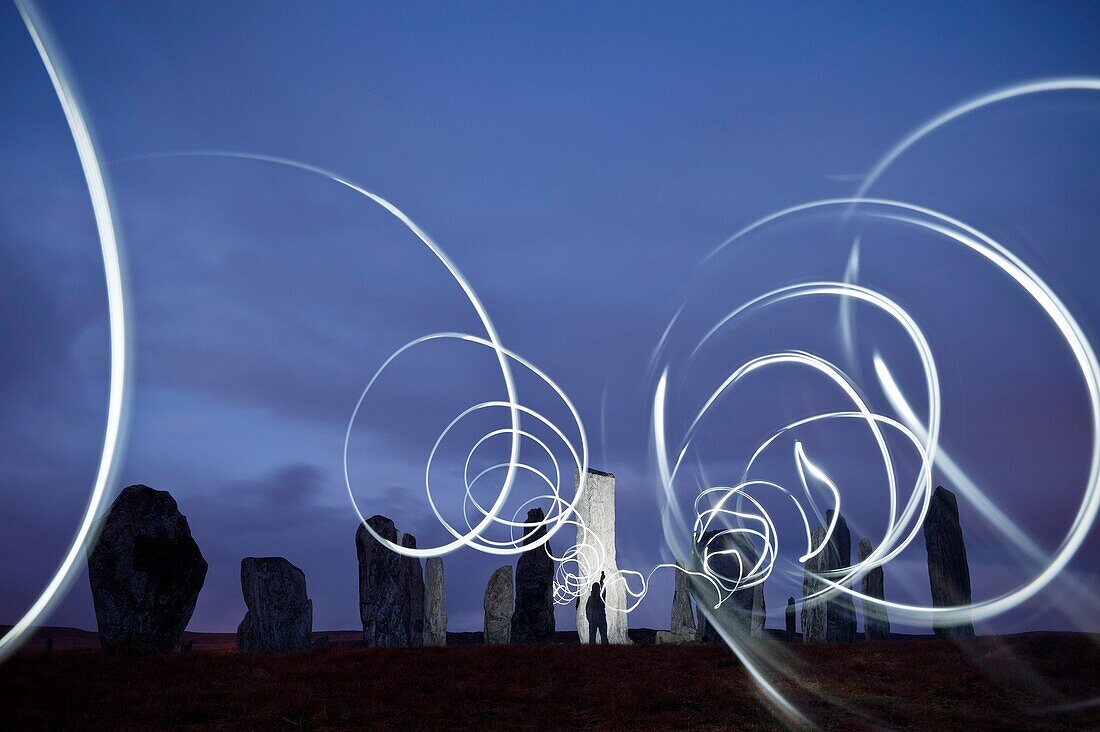 Callanish standing stones at night illuminated by lights, Isle of Lewis, Outer Hebrides, Scotland