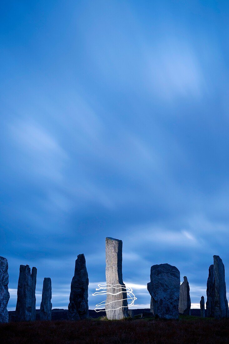 Callanish standing stones illuminated by light at night, Isle of Lewis, Outer Hebrides, Scotland