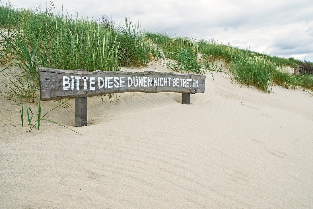 German sign warning to keep of dunes, Juist, Germany