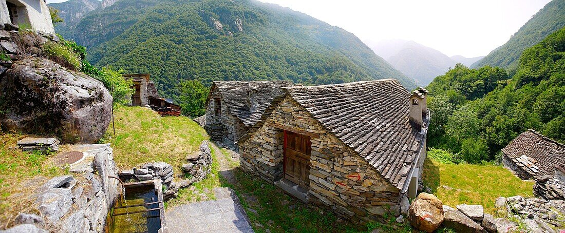 Rustic mountain peasant village of Corippo with stone houses and church -Val Verzasca, Ticino, Alps