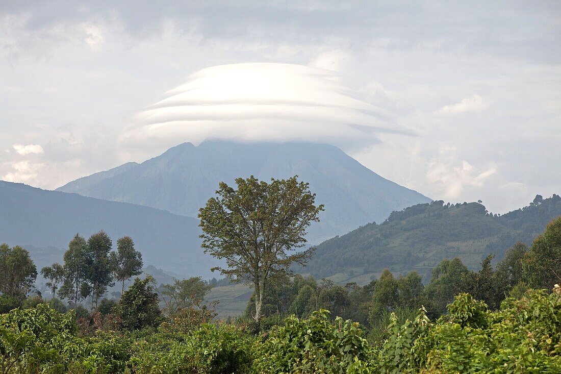 landscape of Virunga Mountains with volcano and clouds, Uganda