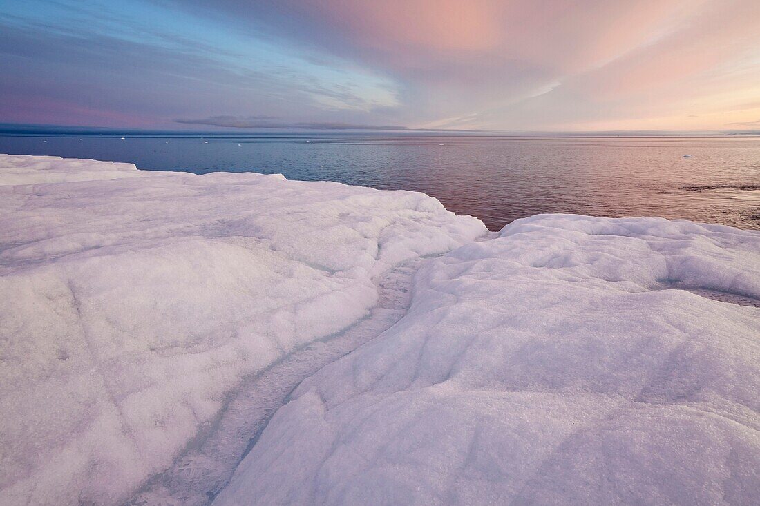 glacier Brasvellbreen and Arctic Sea in sunset light, Nordaustlandet, Svalbard