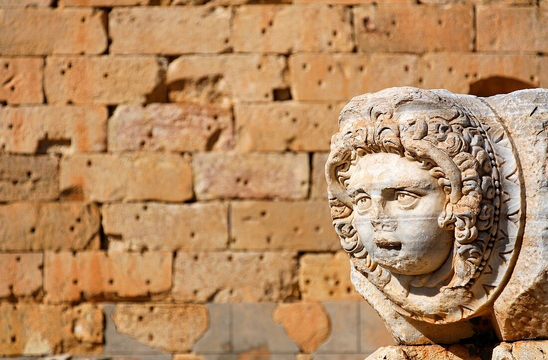 Sculpted Medusa head at the Forum of Severus, Leptis Magna, Libya
