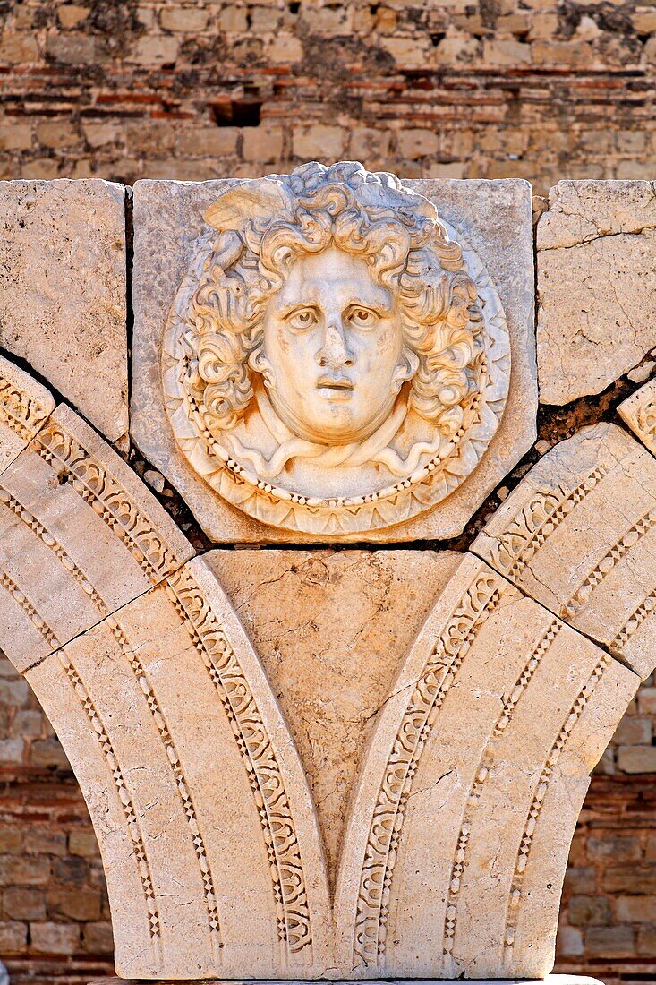 Sculpted Medusa head at the Forum of Severus, Leptis Magna, Libya