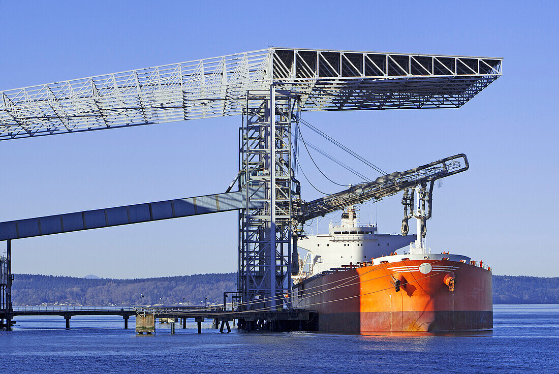 Shipping, grain, bulk carrier, loading at pier in Port of Tacoma, Puget Sound, Salish Sea, Tacoma, Washington.  Pacific Coast, export, shipping, dock, deep water, Commencement Bay, Pierce County, at rest, commerce, food, trade, bio, products., Bulk Carrie