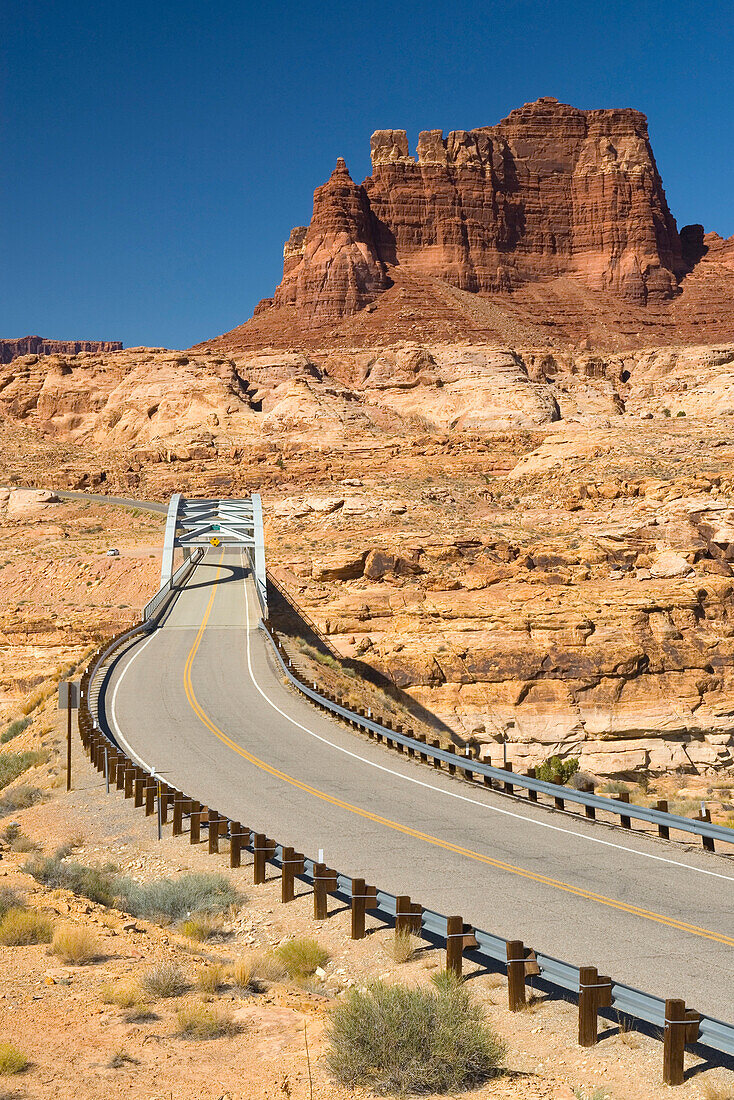 The Hite Crossing Bridge on Utah State Route 95. Crossing the Colorado River, in Glen Canyon National Recreation Area. Buttes, sandstone rock formations and pillars in the landscape., Glen Canyon National Recreation Area, Utah.