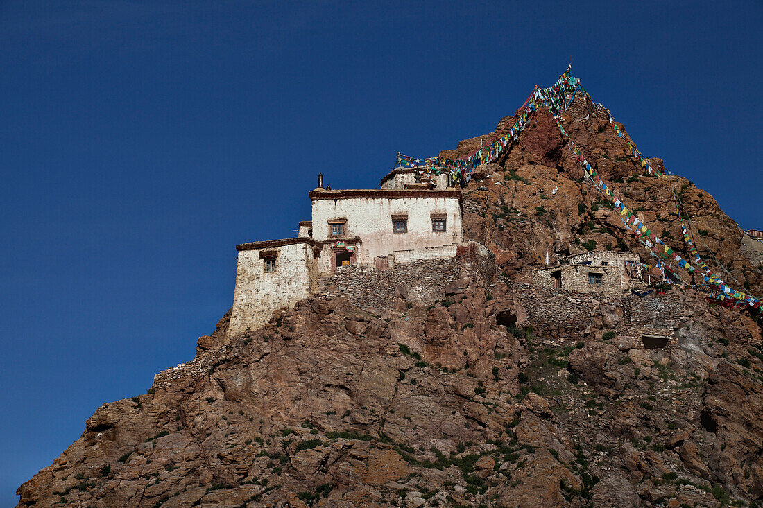 Chiu Buddhist Monastery buildings on the steep hillside overlooking the lake., Chiu monastery overlooking Lake Manasarovar, Tibet Autonomous Region