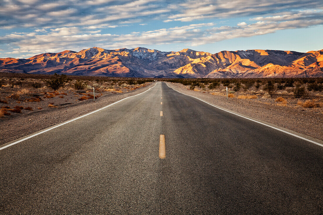 Paved road in Death Valley National Park. The hottest, driest and lowest spot in North America., Paved road, Death Valley National Park, California, USA