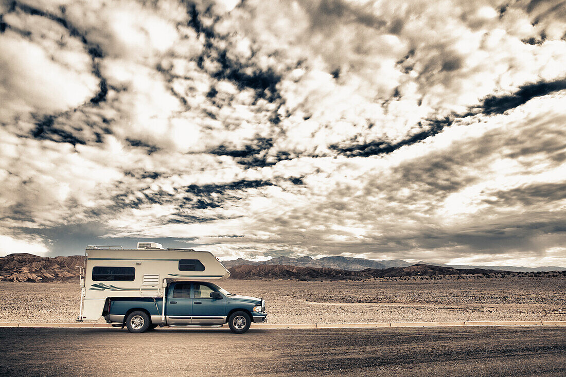 Truck camper in desert, Death Valley National Park, Death Valley, California, USA, Death Valley National Park, California, USA