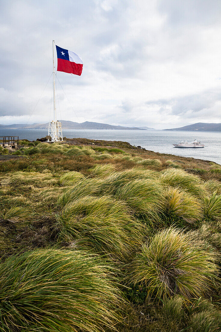 Chilean flag at Cape Horn, Cape Horn National Park, Cape Horn Island, Terra del Fuego, Patagonia, Chile, South America
