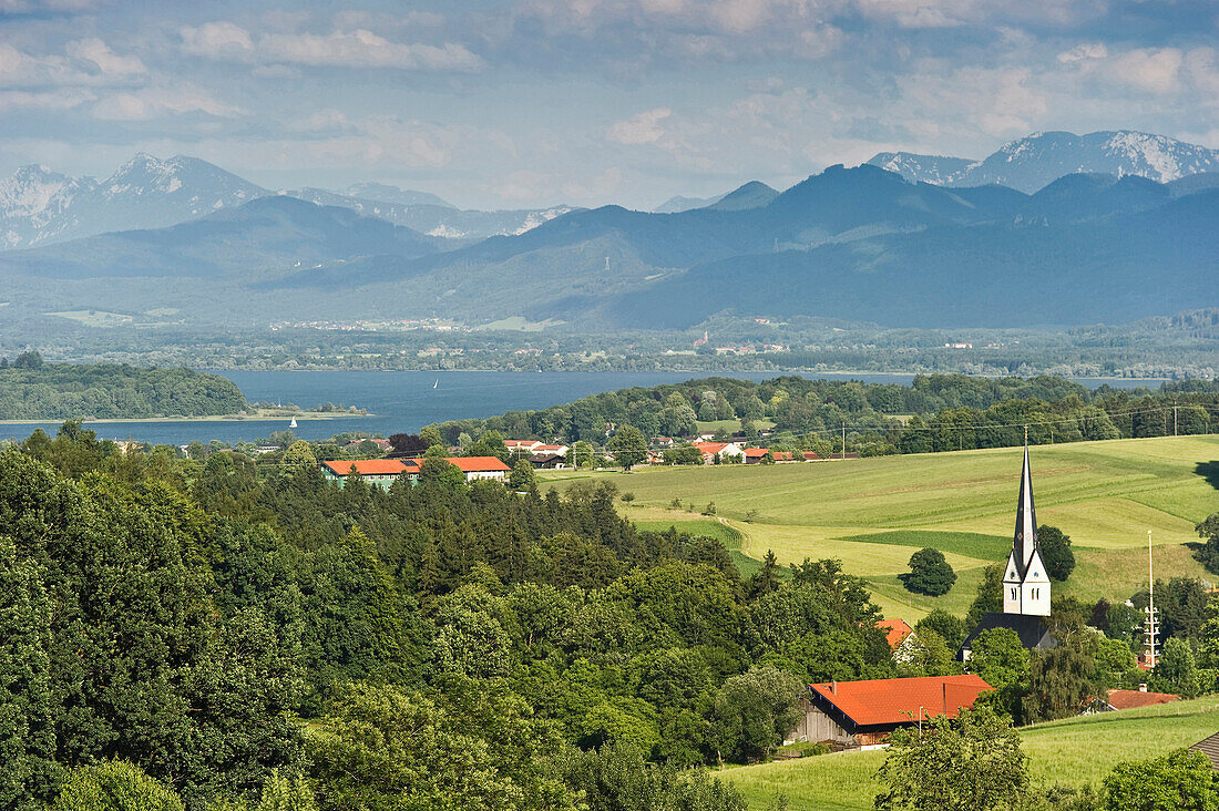 Chiemgau Alps and view of Lake Chiemsee as seen from the Ratzinger Hoehe, Chiemgau, Bavaria, Germany