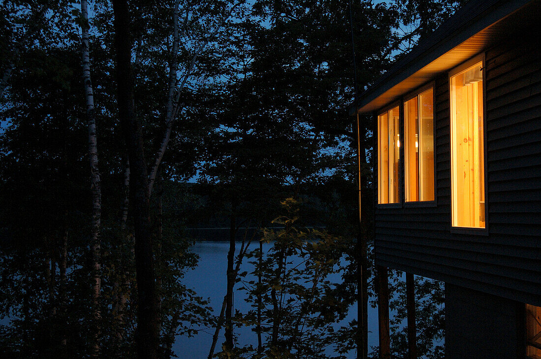 Cottage on Lake at Night