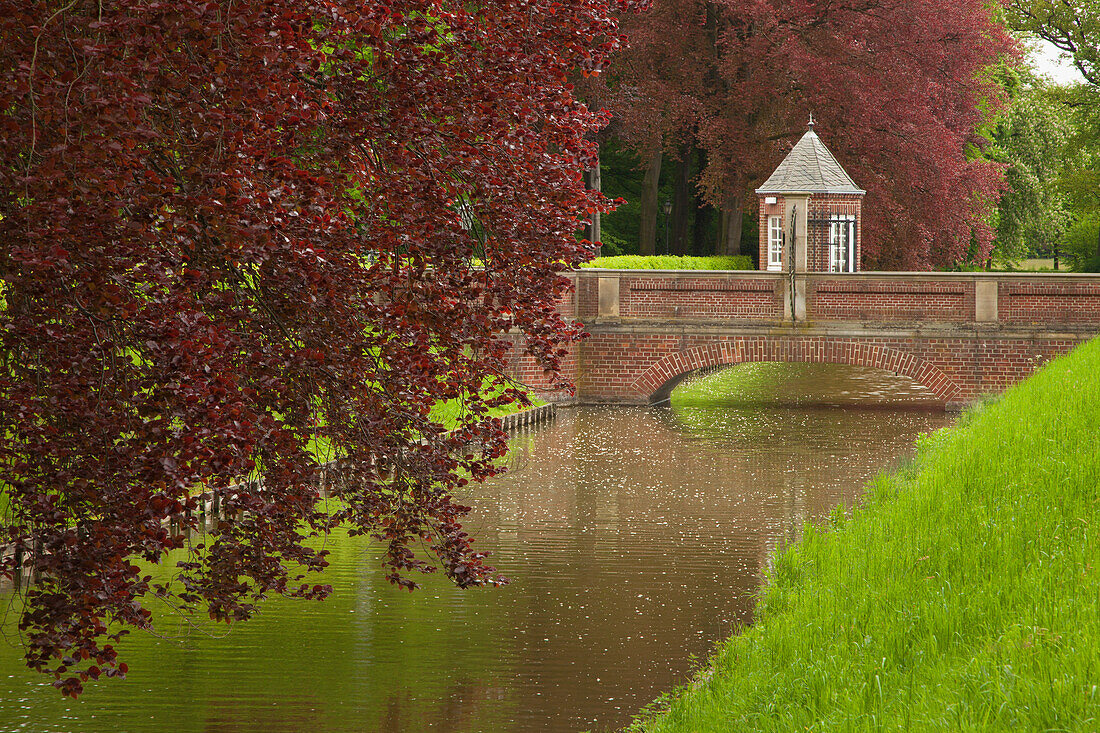 Bridge across the canal, Nordkirchen moated castle, Muensterland, North Rhine-Westphalia, Germany, Europe