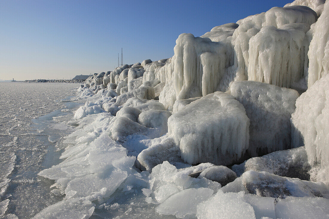 Icy mole at Sassnitz, Island of Ruegen, Mecklenburg Western Pomerania, Germany, Europe