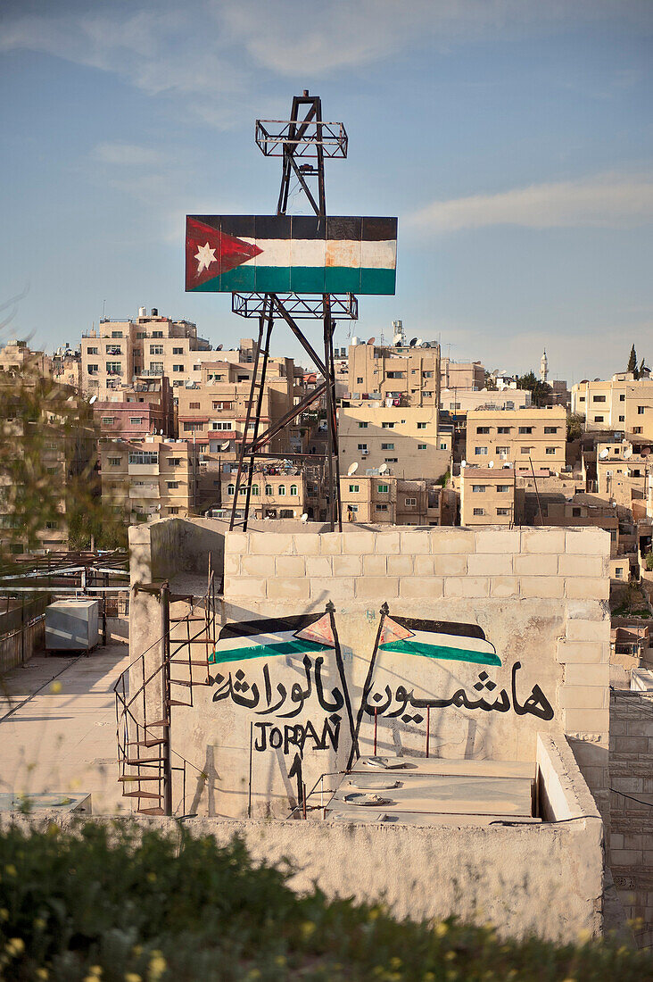 Arab graffiti and Jordan flag at the capital Amman, Jordan, Middle East, Asia