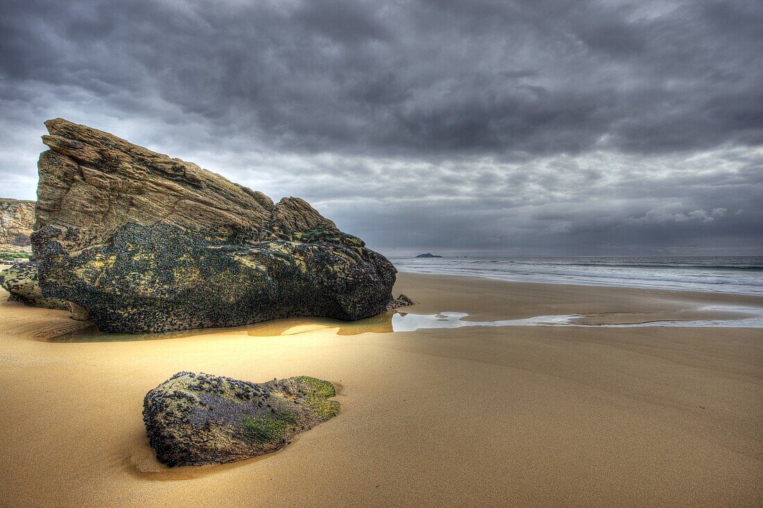 France, Brittany, Quiberon, La Cote Sauvage, rocks on the sand