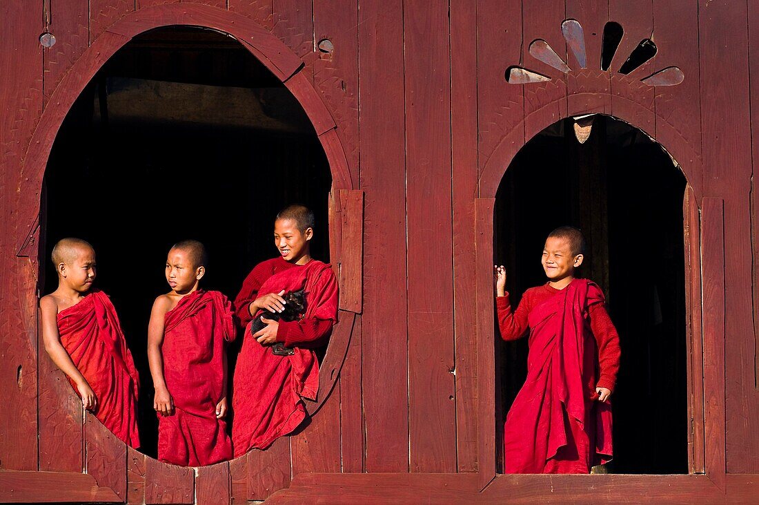 Myanmar (Burma), Shan State, Shwe Yan Pye, Shwe Yan Pye monastery, bonzes like to look at the oval windows of the temple