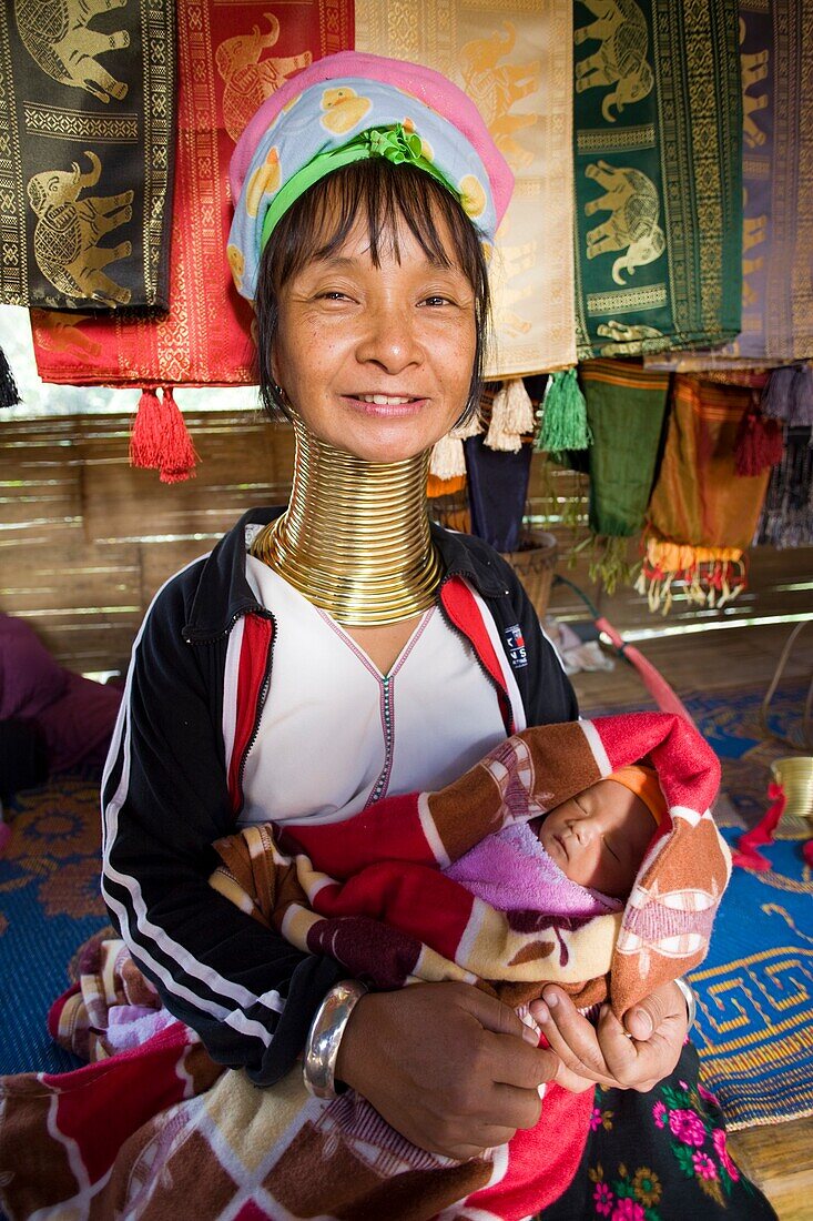 Thailand,Golden Triangle,Chiang Rai,Long Neck Karen Hilltribe,Long Neck Woman with Baby