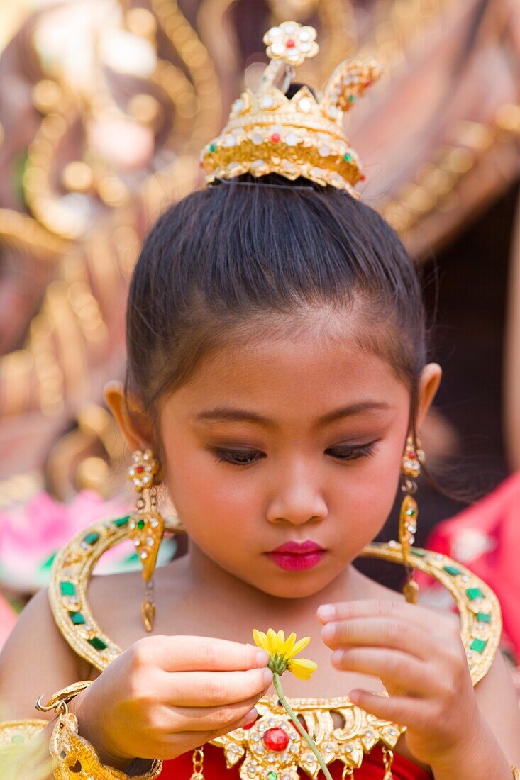Thailand,Chiang Mai,Portrait of Girl in Traditional Thai Costume at the Chiang Mai Flower Festival