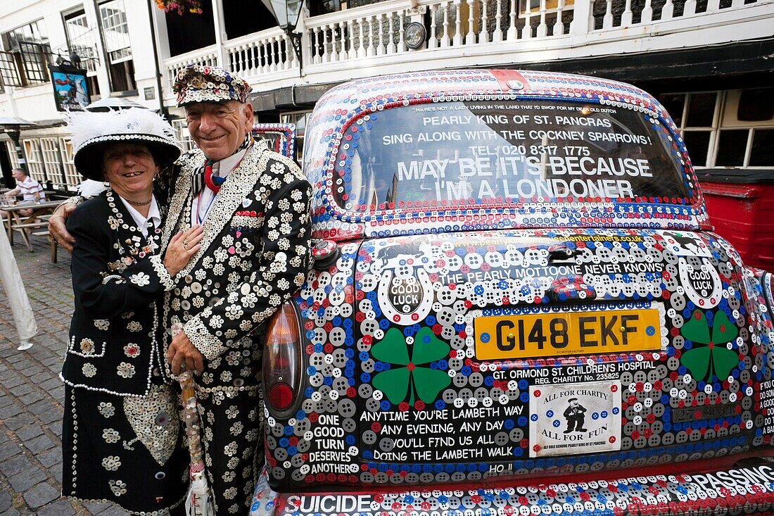 England,London,Pearly King and Queen and Decorated London Taxi