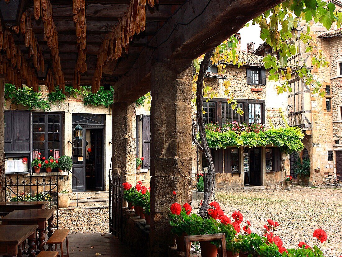France, Pérouges, Ain (01), Place de la Halle, Branded The Most Beautiful Villages of France, flowered facades