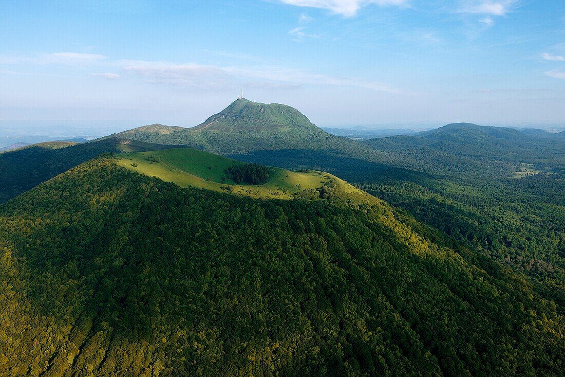 France, Puy de Dome (63), the Puy de Dome volcano is 1465 meters, of the Puys, labeled Grand Site de France, at the forefront of the Puy Pariou (aerial view)