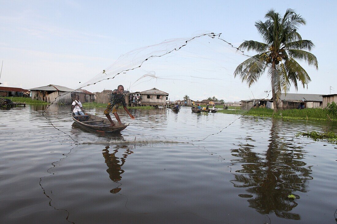 Fishing in Ganvie lake village on Nokoue Lake. Ganvie. Benin.