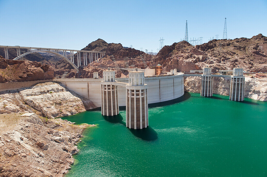 Hoover Dam and Lake Mead. Hydroelectric power generation.  Intake towers and dam wall. Electrcity cables and pylons., Hoover Dam and Lake Mead, USA