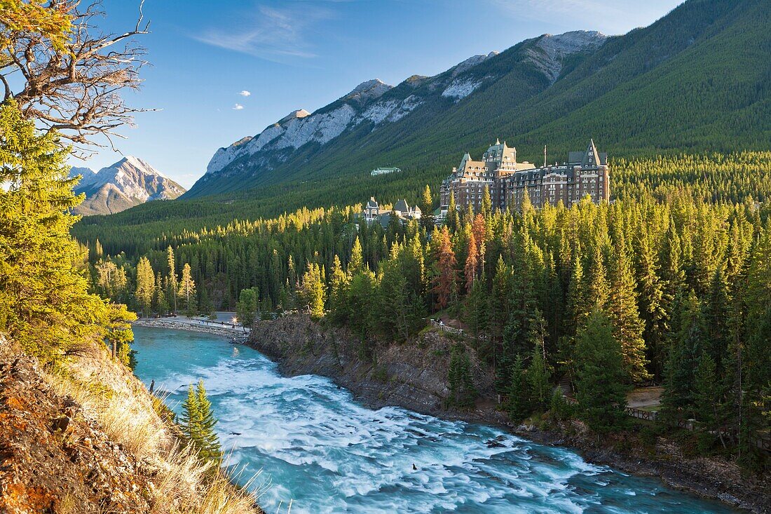 The imposing Banff Springs Hotel with Bow River, Banff National Park, Alberta, Canada