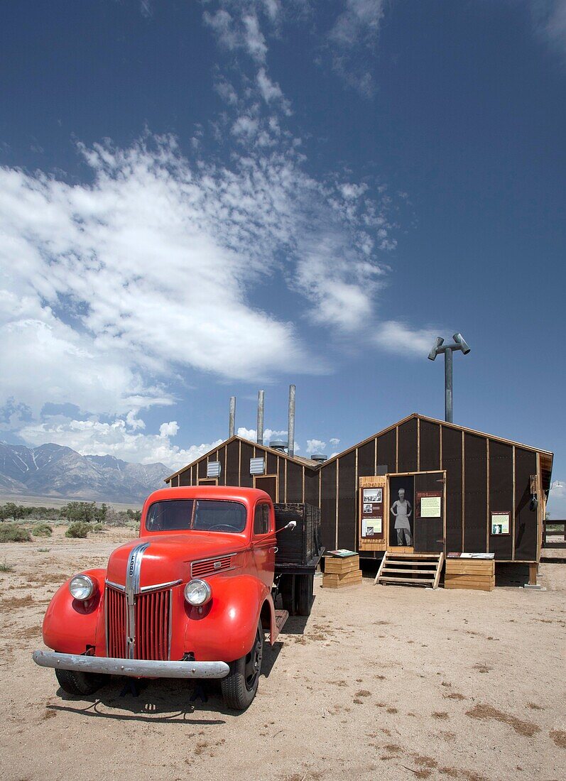 Independence, California - A vintage truck in front of a restored mess hall at the Manzanar Internment Camp, one of 10 camps where Japanese-Americans were held during World War II  The site has been preserved as the Manzanar National Historic Site by the.