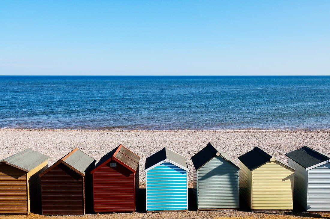 Beach huts overlooking the English Channel at Budleigh Salterton, Devon, England, United Kingdom
