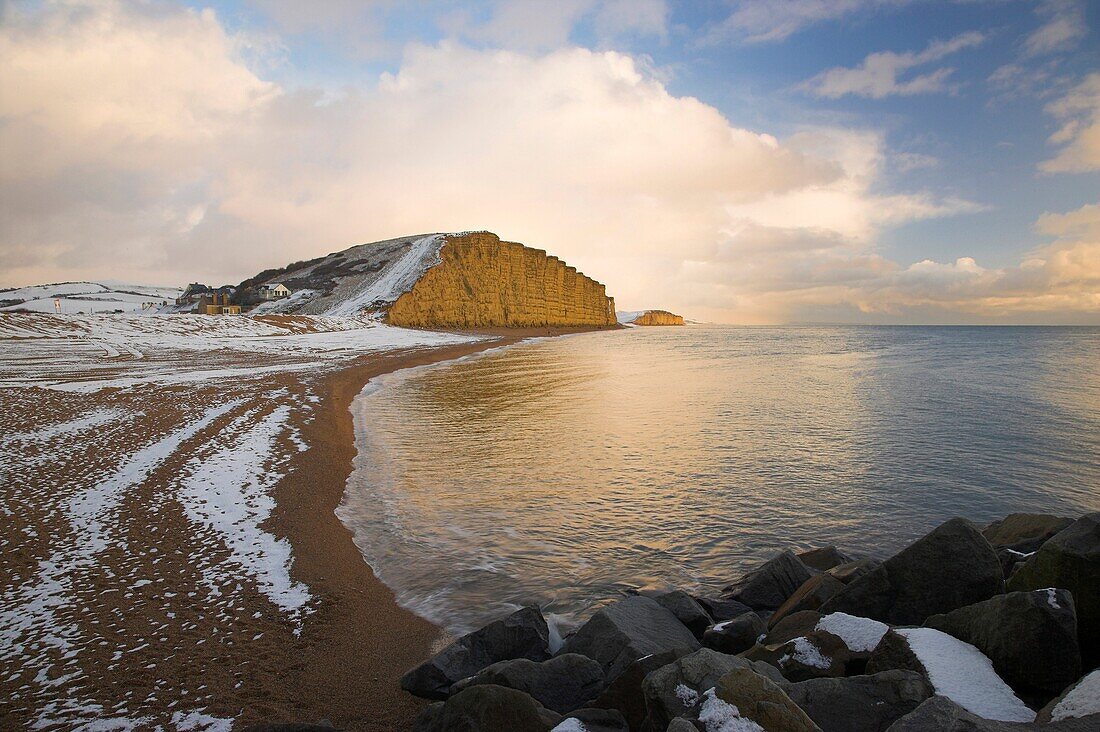 Rare occurance of snow on the beach and Sand Stone Cliffs of West Bay Dorset