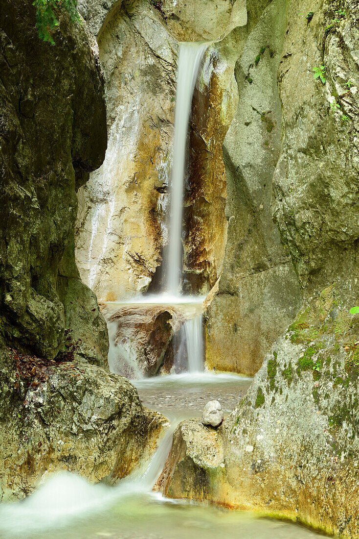 Waterfall flowing down in several steps, Bavarian alps, Upper Bavaria, Bavaria, Germany