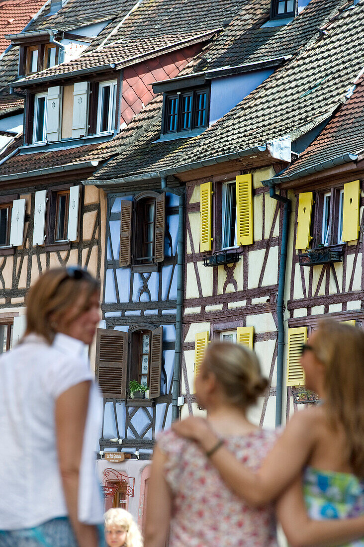 Woman and daughters in Petite Venise, Colmar, Alsace, France