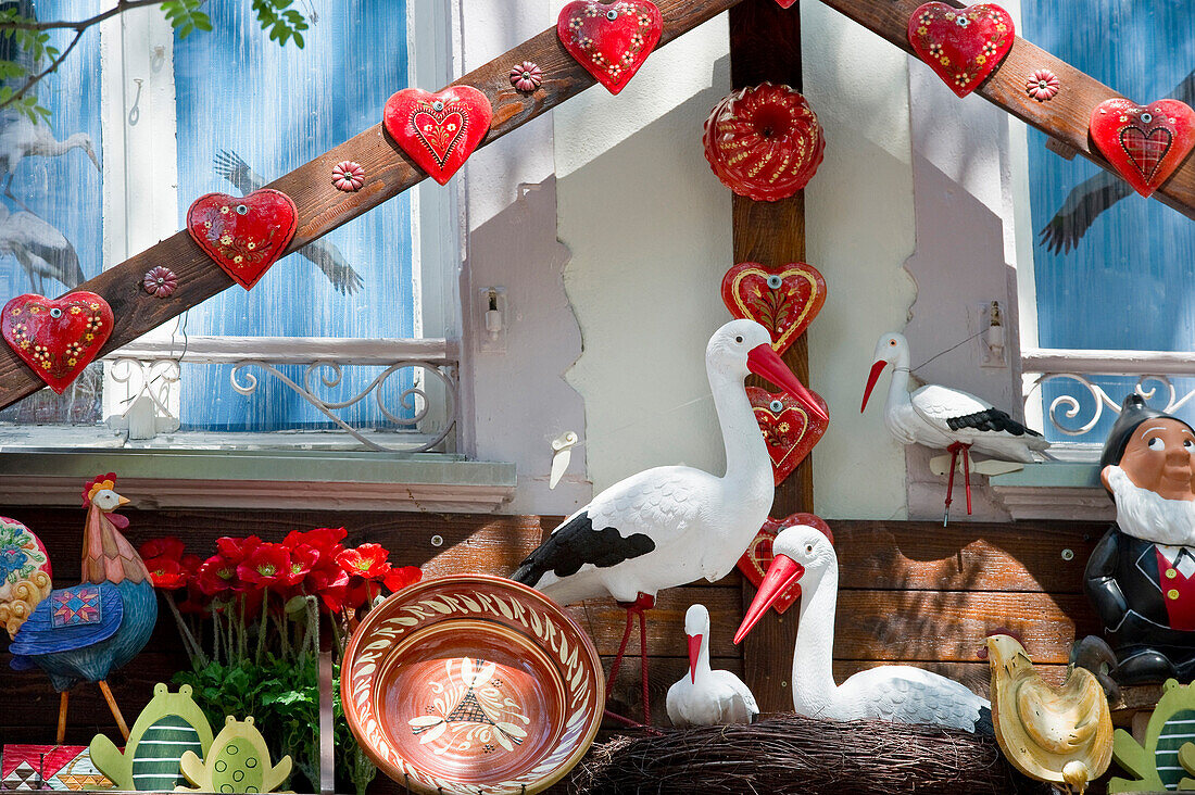 House fassade with decorative storks and ceramics, Petite Venise, Colmar, Alsace, France