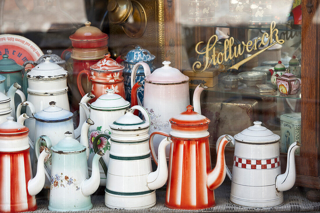 Old coffee pots in the window of a coffee shop, Colmar, Alsace, France