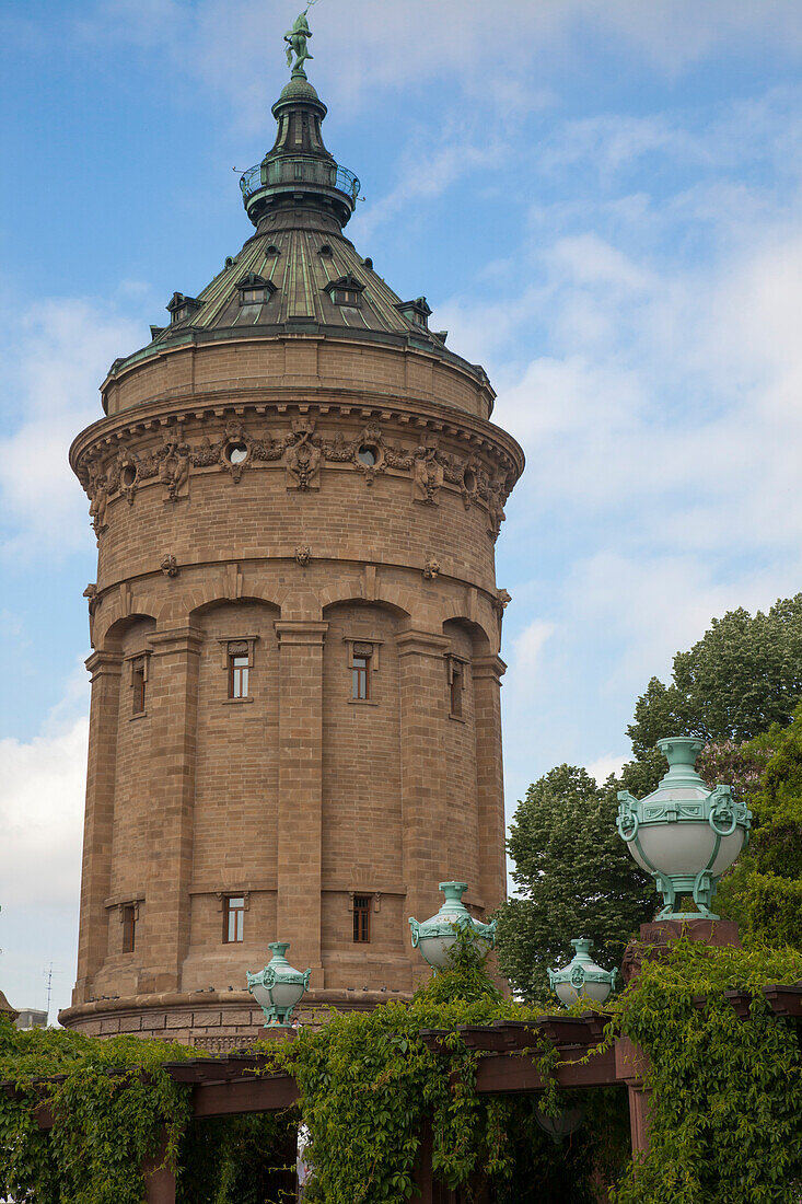 Fountains and water tower at the park, Mannheim, Baden-Wurttemberg, Germany, Europe