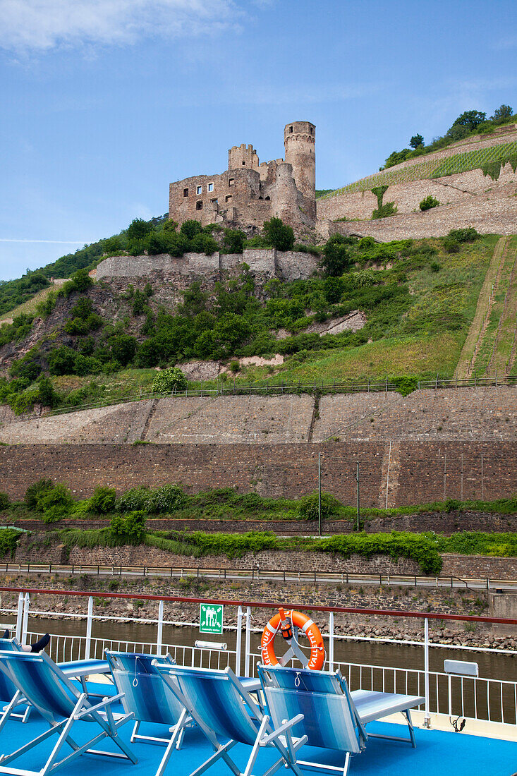 View of Rhine river cruise ship MS Bellevue and Burg Ehrenfels castle, Rudesheim am Rhein, Hesse, Germany, Europe