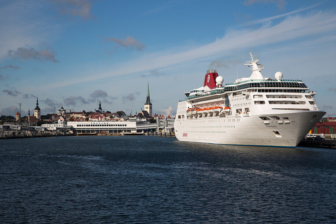 Cruise ship MS Empress in front of steeples of Tallinn, Harjumaa, Estonia, Baltic States, Europe