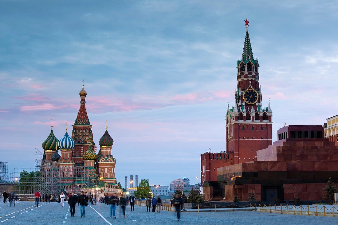 Russia, Moscow Oblast, Moscow, Red Square, Saint Basils Cathedral and Kremlin Spasskaya Tower, evening