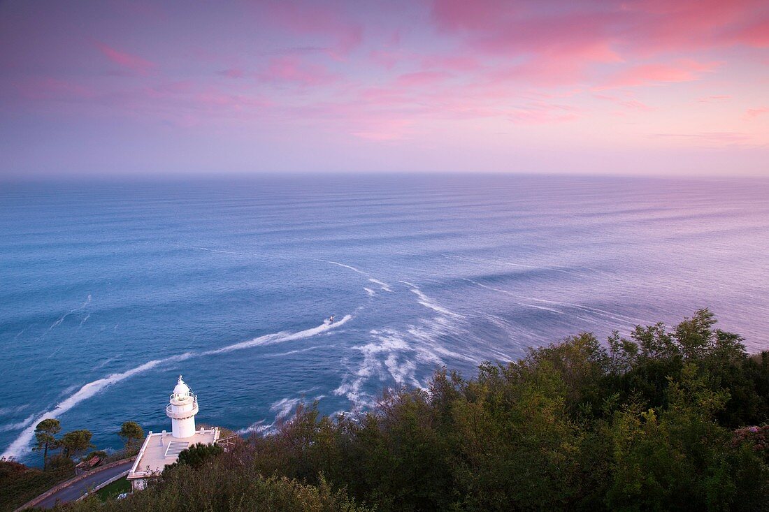 Spain, Basque Country Region, Guipuzcoa Province, San Sebastian, elevated view of the Monte Igueldo lighthouse, dawn