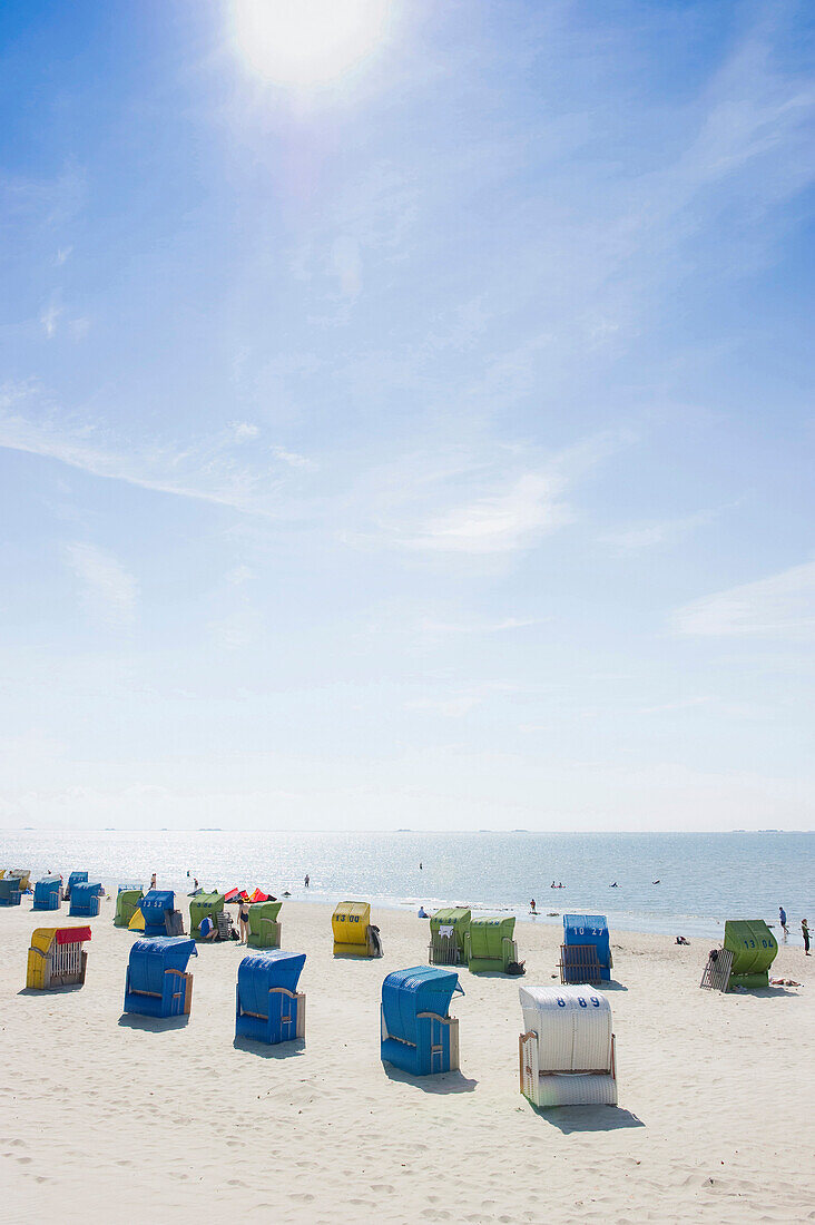 Colourful beachchairs in the sunlight, Wyk, Foehr, North Frisian Islands, Schleswig-Holstein, Germany, Europe