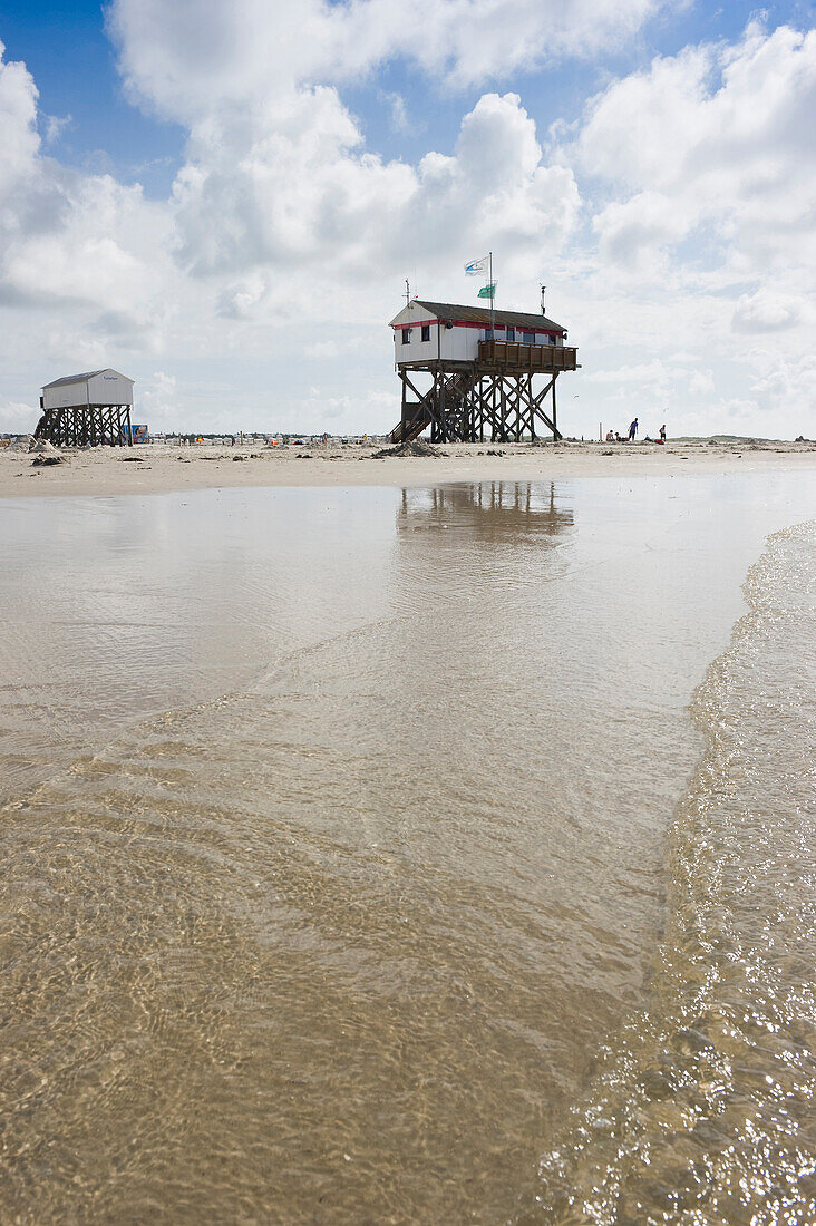 Stilt houses on the beach, Sankt Peter-Ording, Wadden Sea National Park, Eiderstedt peninsula, North Frisian Islands, Schleswig-Holstein, Germany, Europe