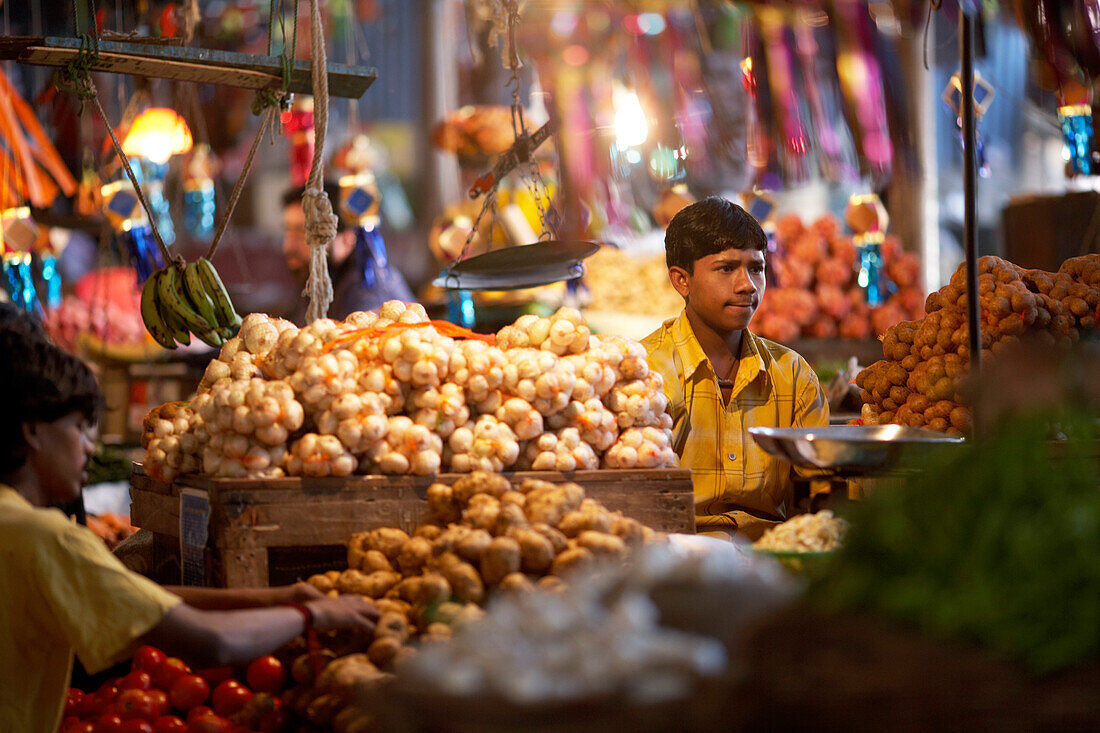 Young market seller at the market, Pune, Maharashtra, India