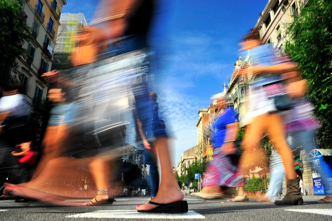 Pedestrian crossing in street Aragó with Passeig de Gràcia, Barcelona, Catalunya, Spain