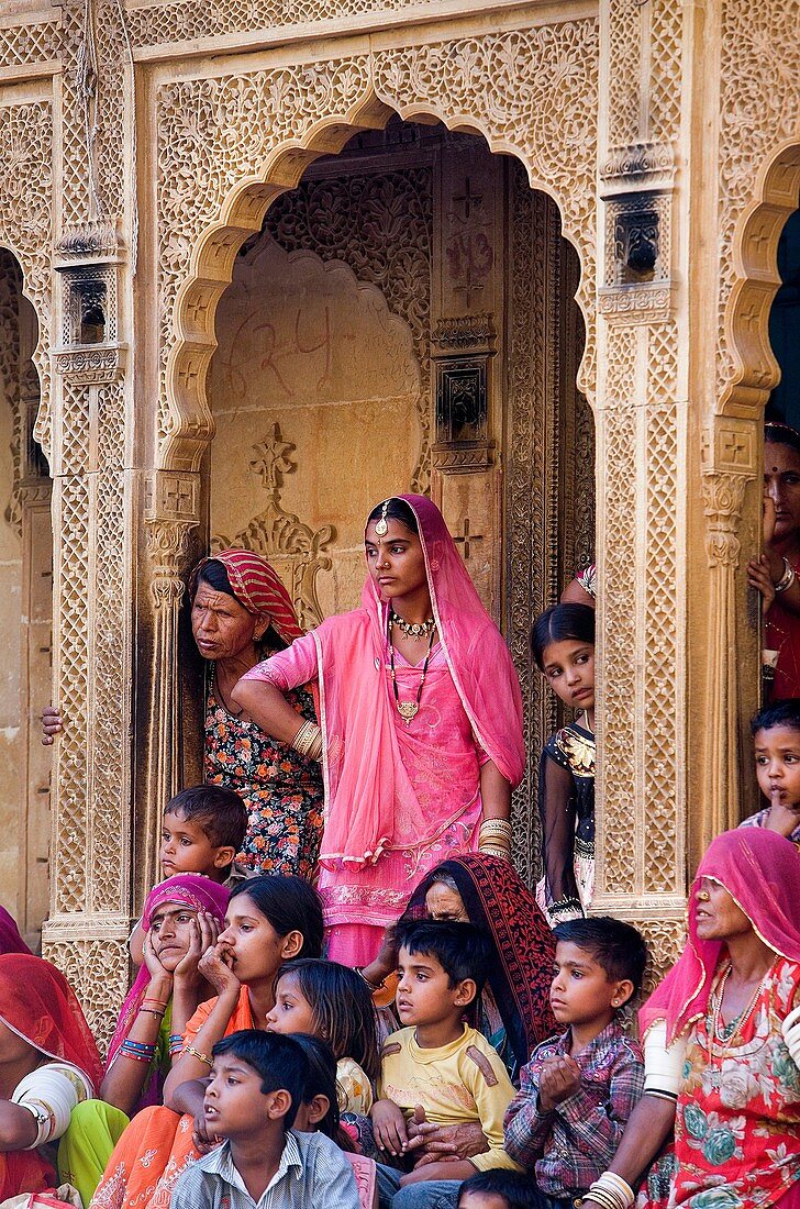 Gangaur festival,people watching a parade inside the Fort near Raj Mahal Royal Palace,Jaisalmer, Rajasthan, India
