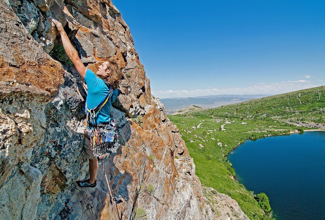 Nic Houser rock climbing a route called Angel Toes which is rated 5,10 and located on The Angel Lake Crag above Angel Lake high in the East Humboldt Mountains of northern Nevada